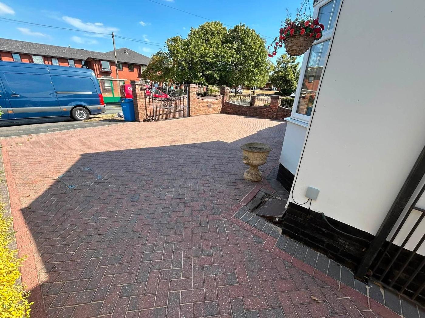 Driveway cleaning in progress