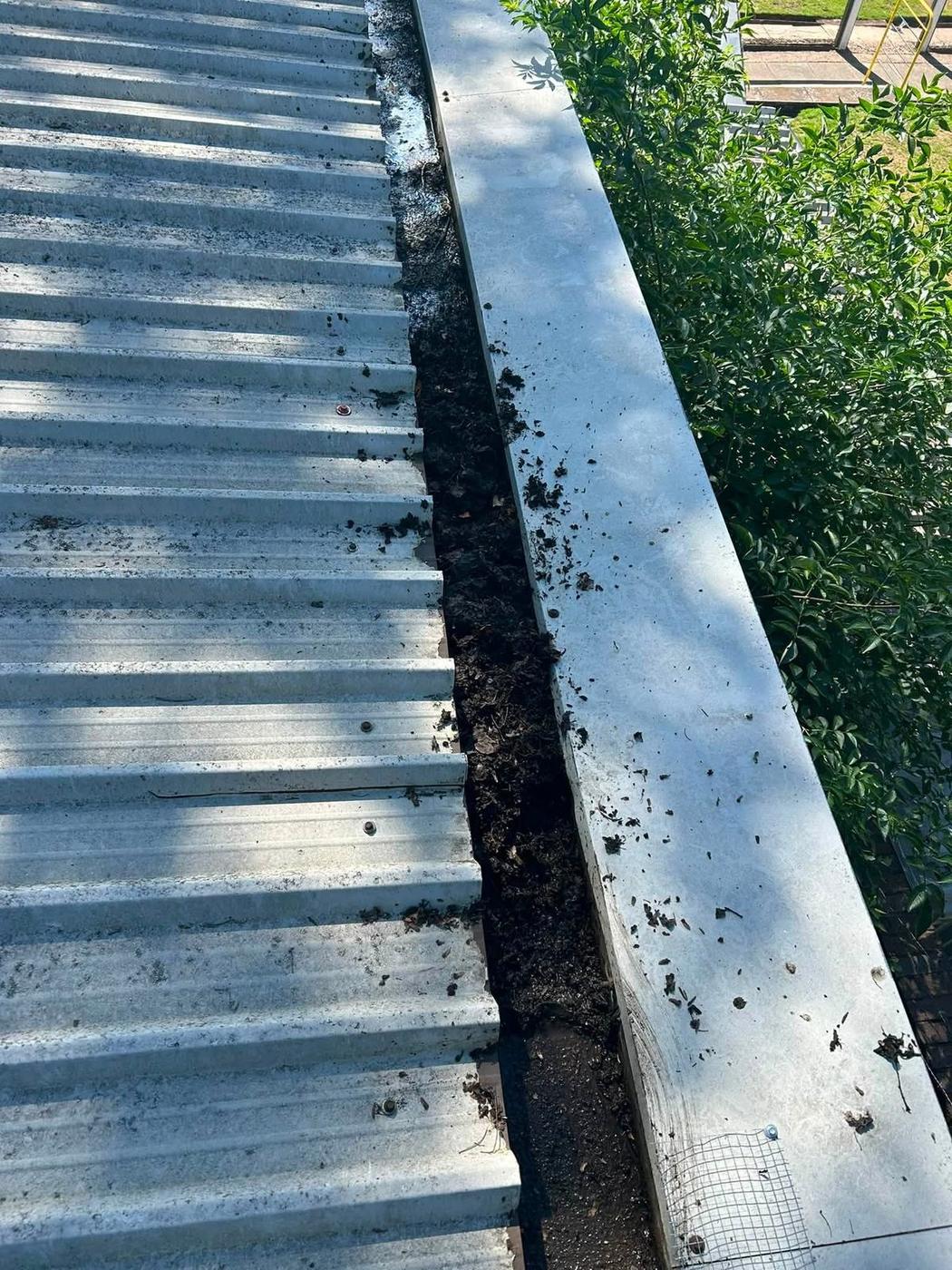Gutter cleaning job, Bilston